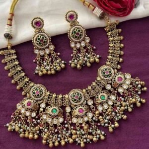 Traditional Gold Finish Temple Necklace Set with Green Enamel, Pink Stones & Pearl Drops